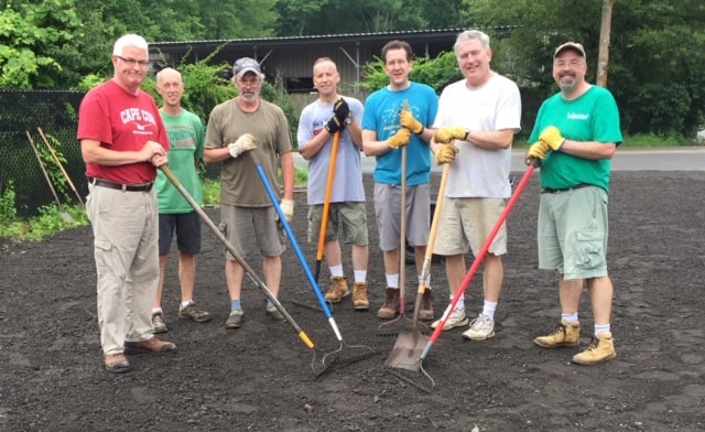 Easton Lions repair the Thrift Store driveway.