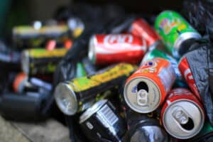 Pile of soda cans ready for deposit return.