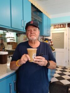 Thrift Dungeon Master Jim Baker with a Parker Coffee at the Beanery